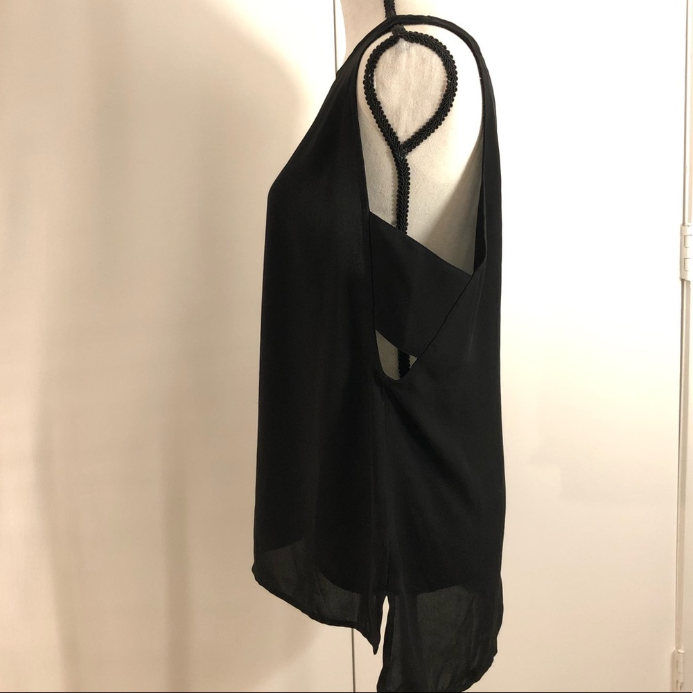Trouvé Tank with Cut Outs